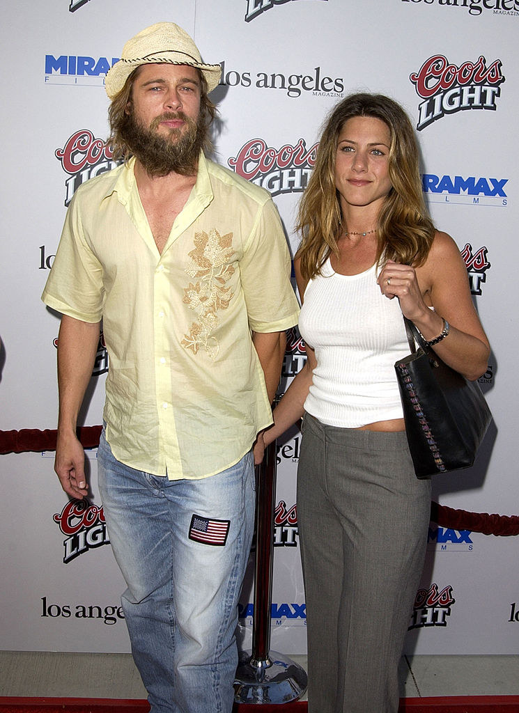 brad and jen looking like kid rock and pam anderson