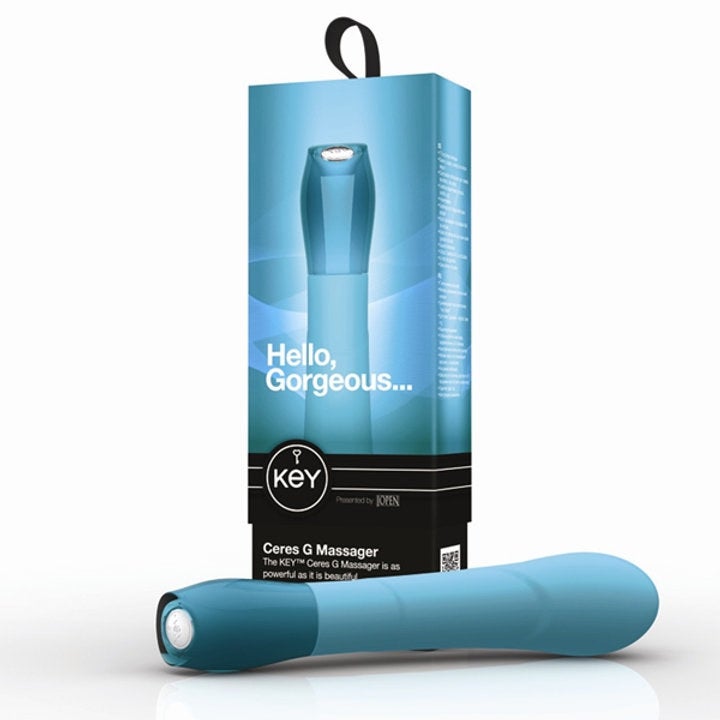 Blue vibrator next to box