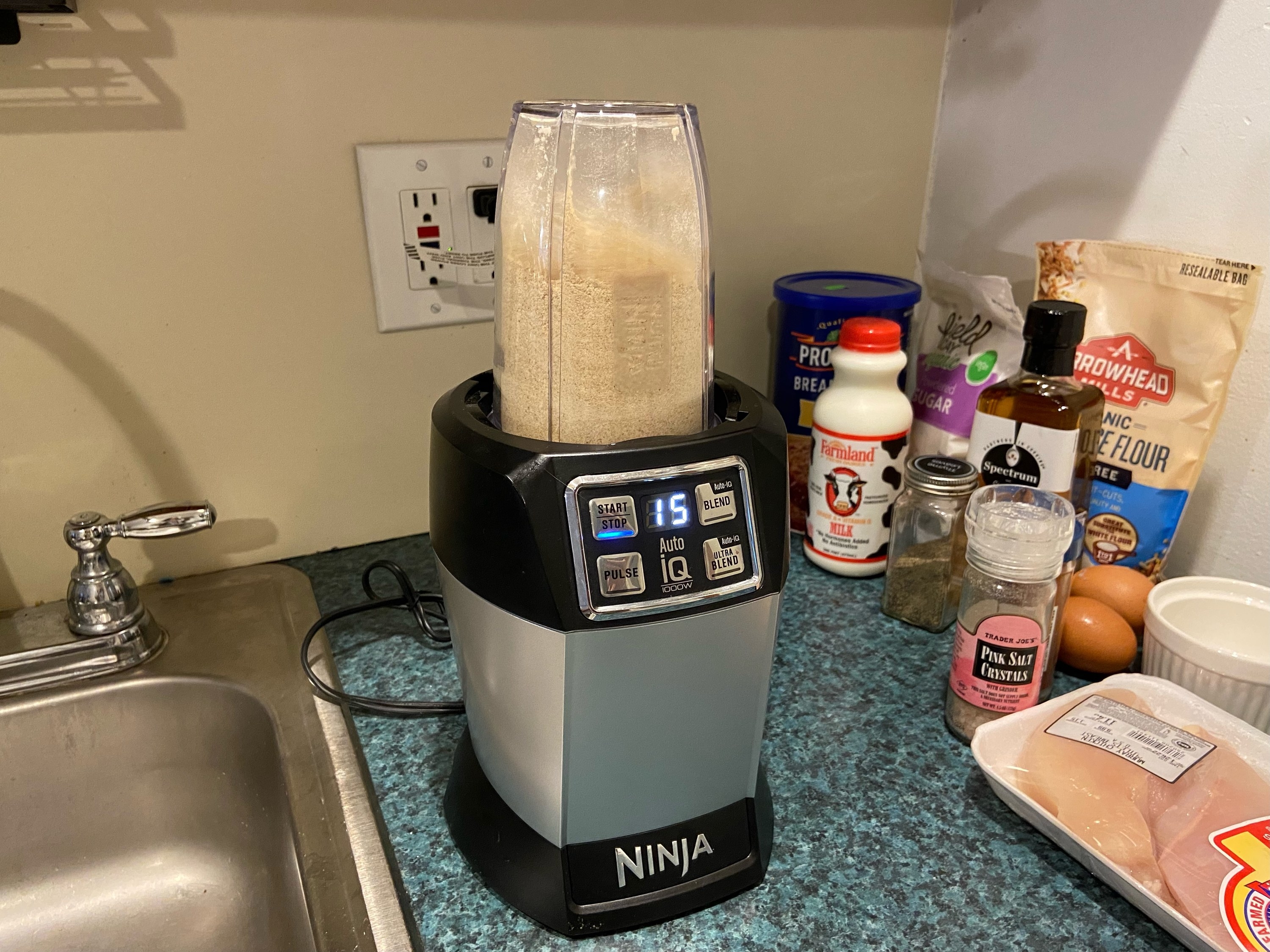 A blender mixing up the bread crumbs.