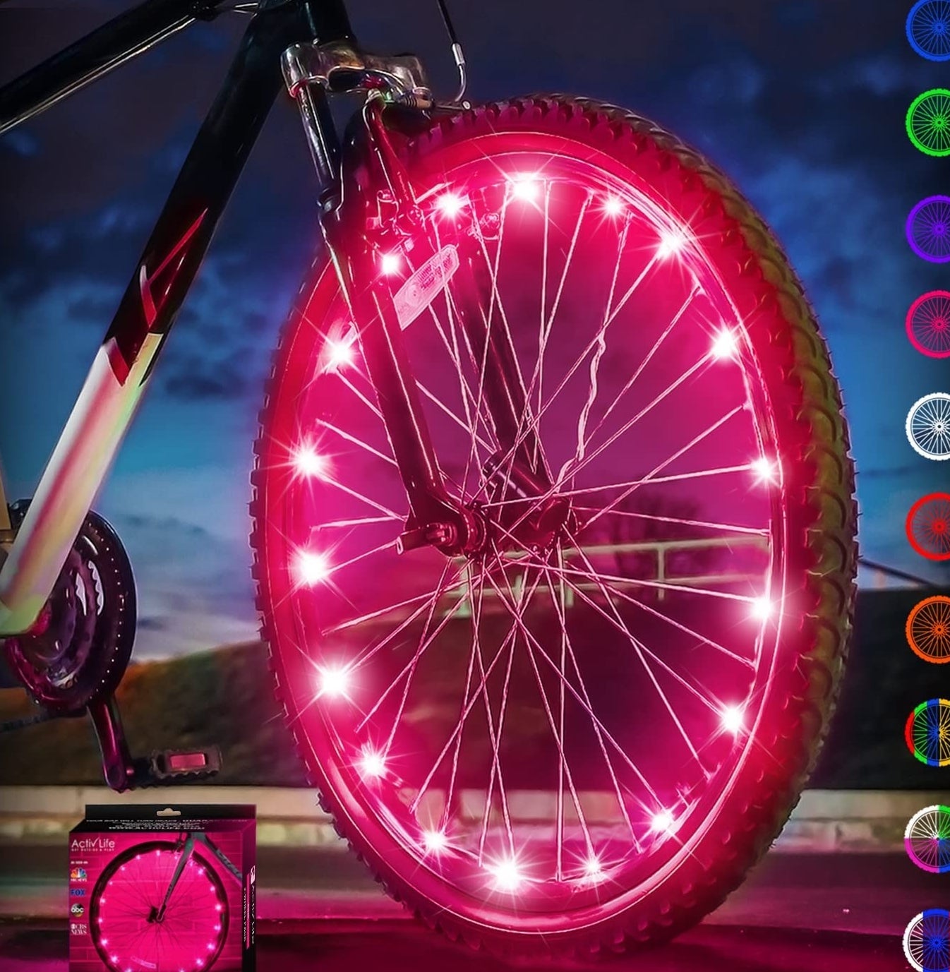 The light on the rim of a bike wheel