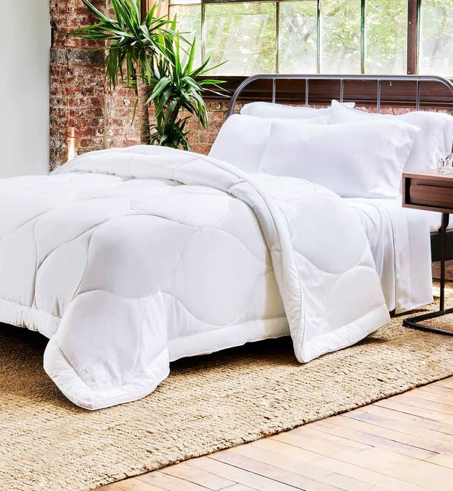 the white comforter on a bed
