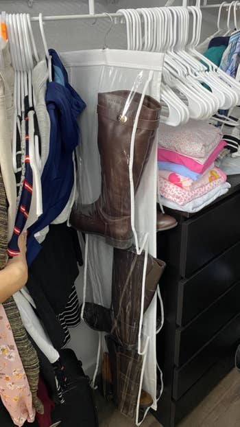 Reviewer's boots placed in hanger closet storage