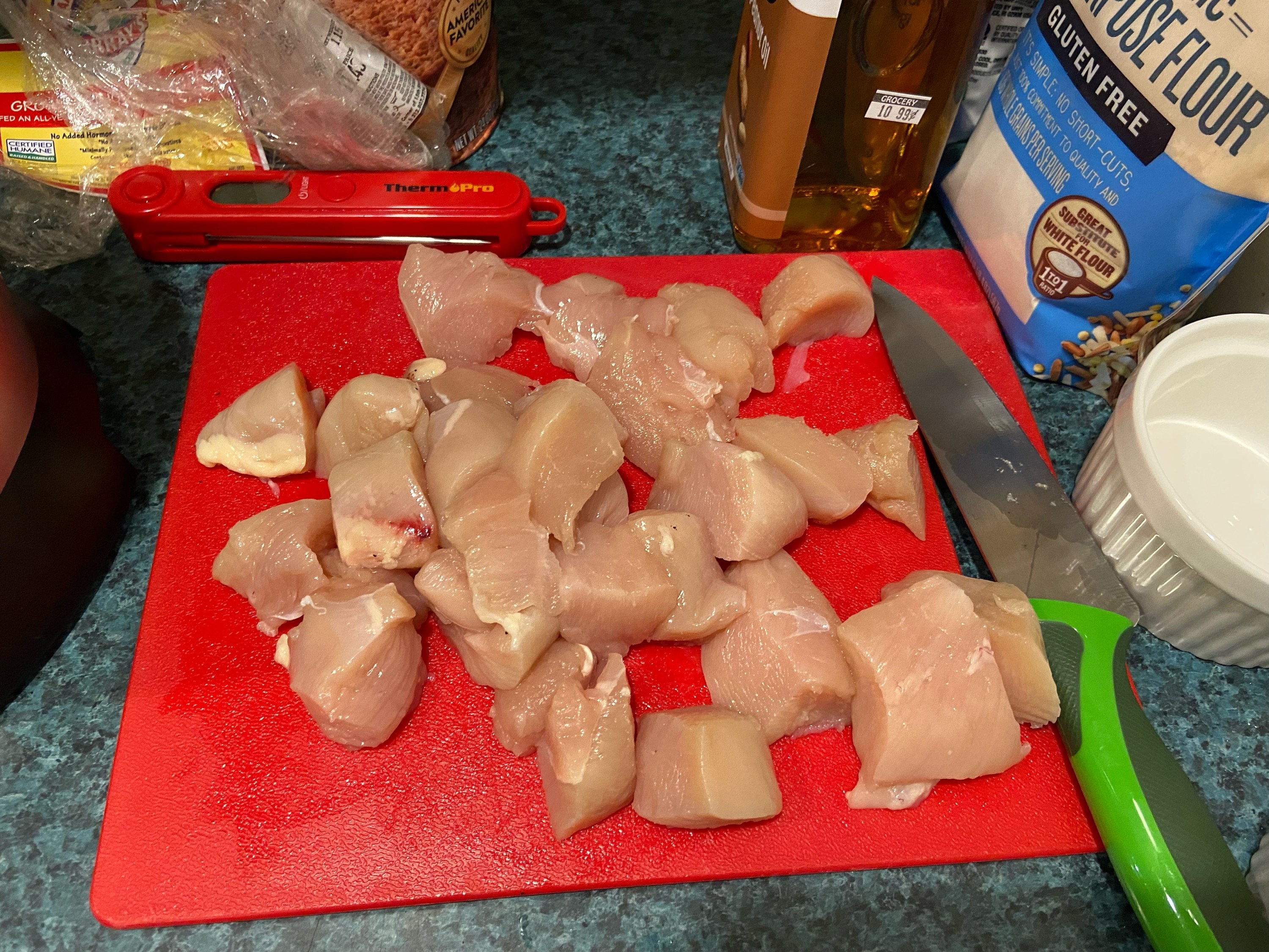 Sliced pieces of raw chicken.