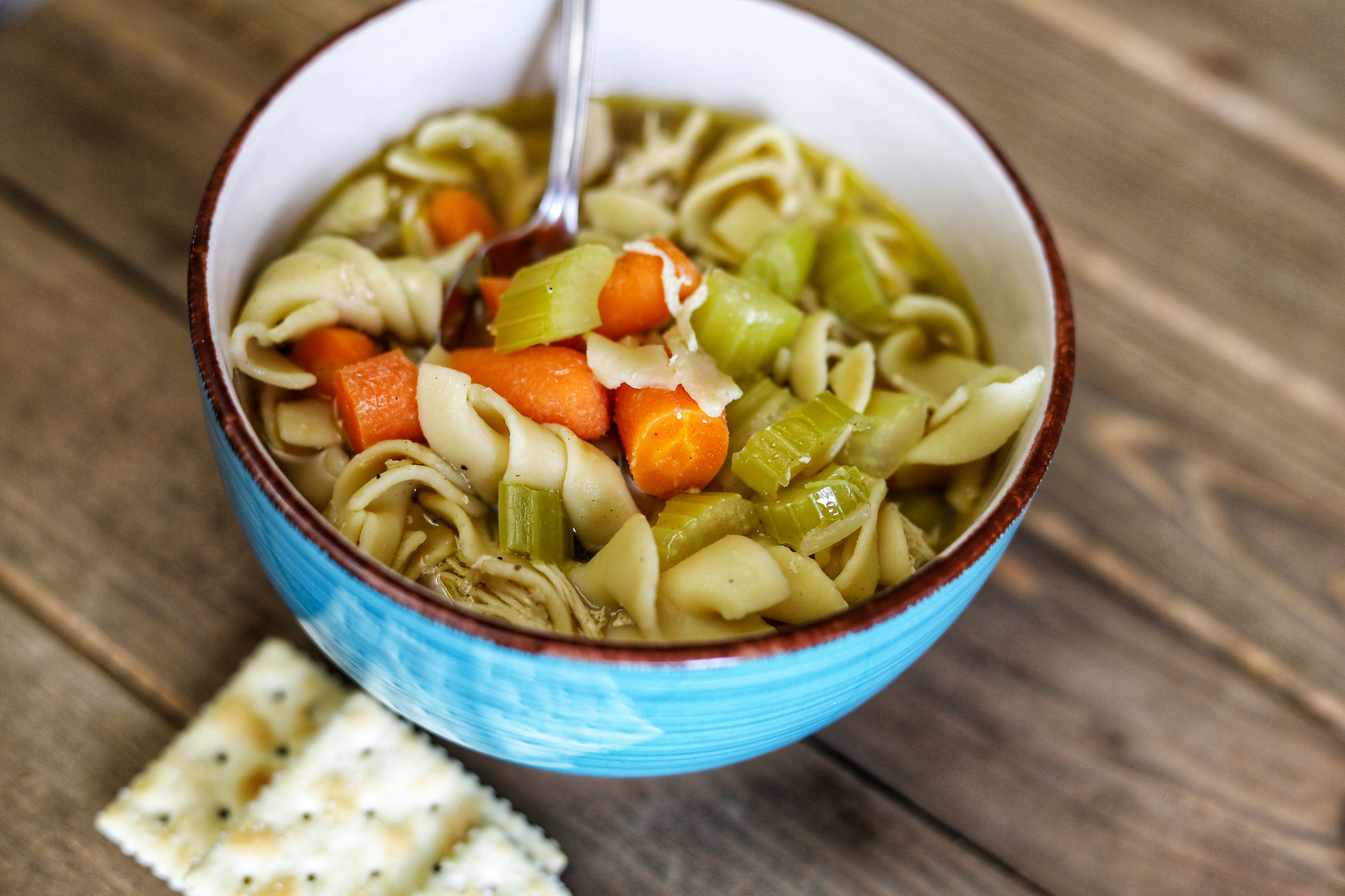 Chicken noodle soup in a bowl.