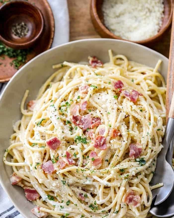 Cheesy pasta with bacon bits.