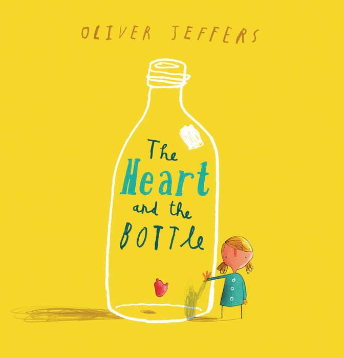 Yellow cover. A little white girl stands next to a big bottle. Inside the bottle is a small anatomical heart. Above the heart are the words: The Heart and the Bottle