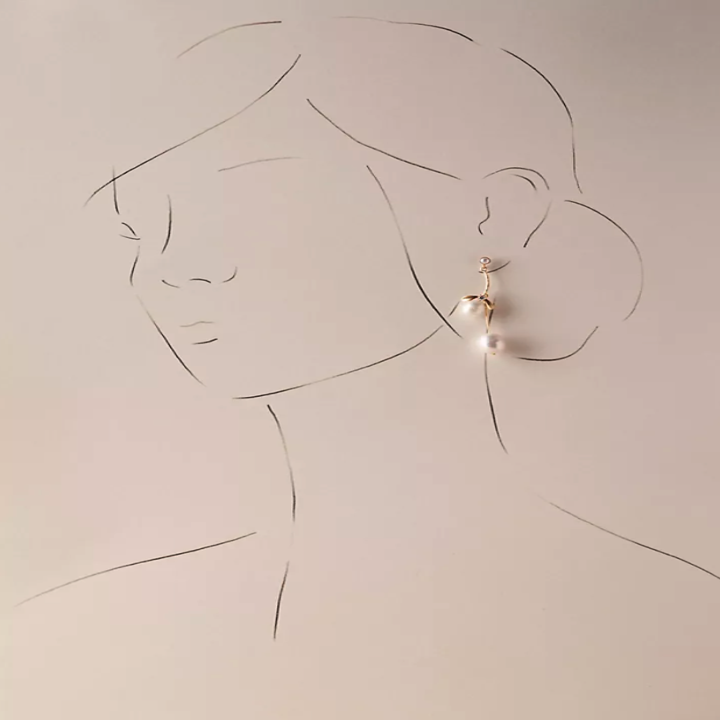 Image of the "Pearl Bloom" earrings on a drawn model