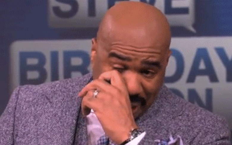 Steve Harvey wiping his eye