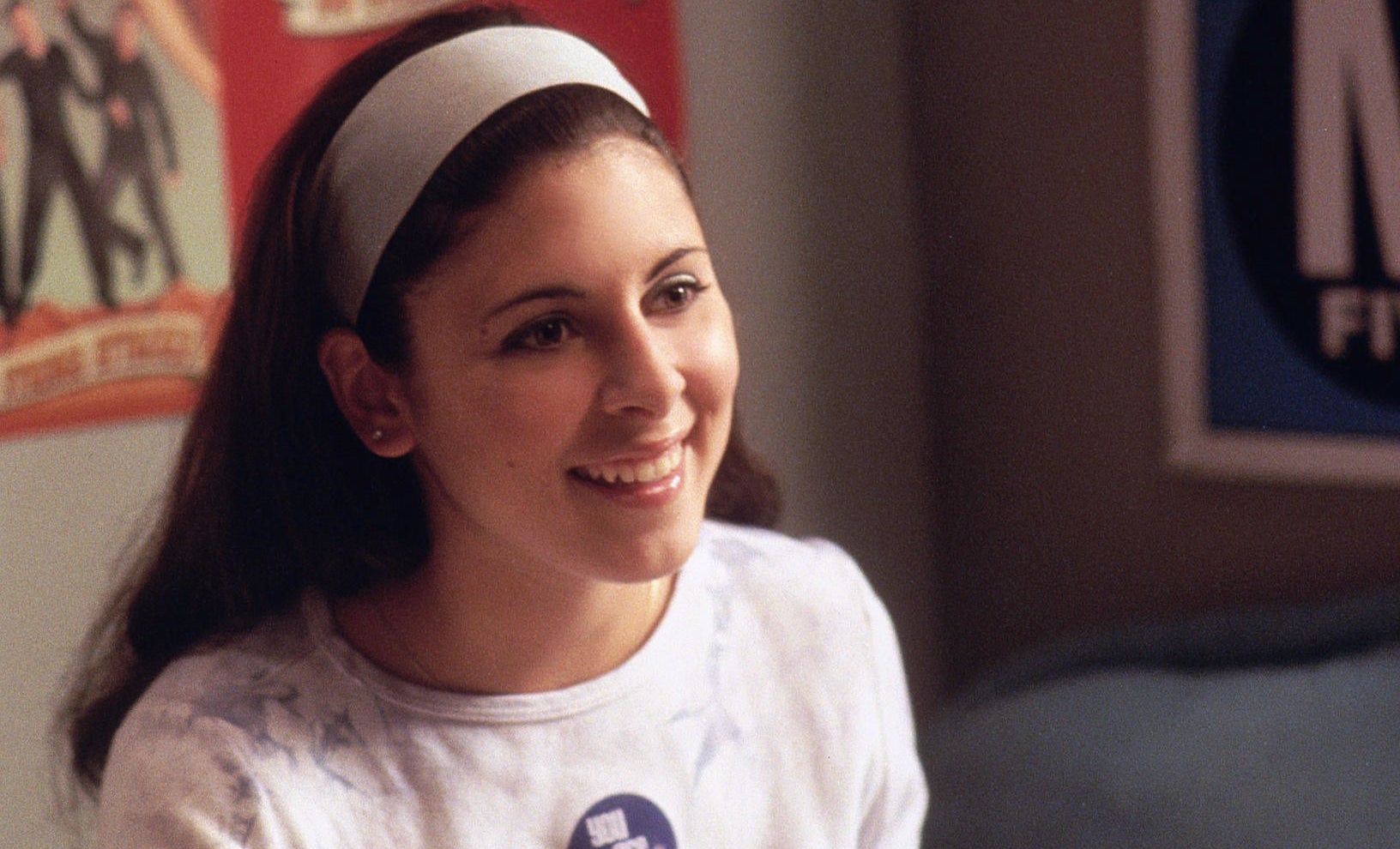 Meadow wearing a headband and smiling