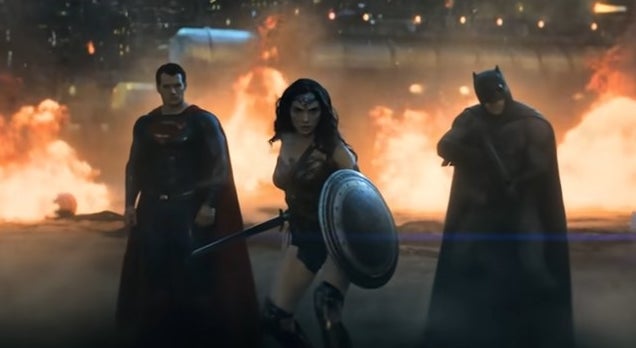 Superman, Wonder Woman, and Batman standing together in front of a wall of fire in &quot;Batman v Superman: Dawn of Justice&quot;