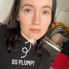 Writer with the gloss on their lip and the text "So Plump" overlaid on the image