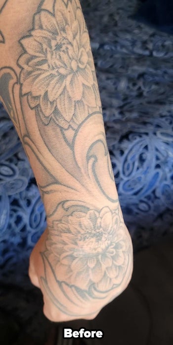 a reviewer photo of an arm tattoo labeled 