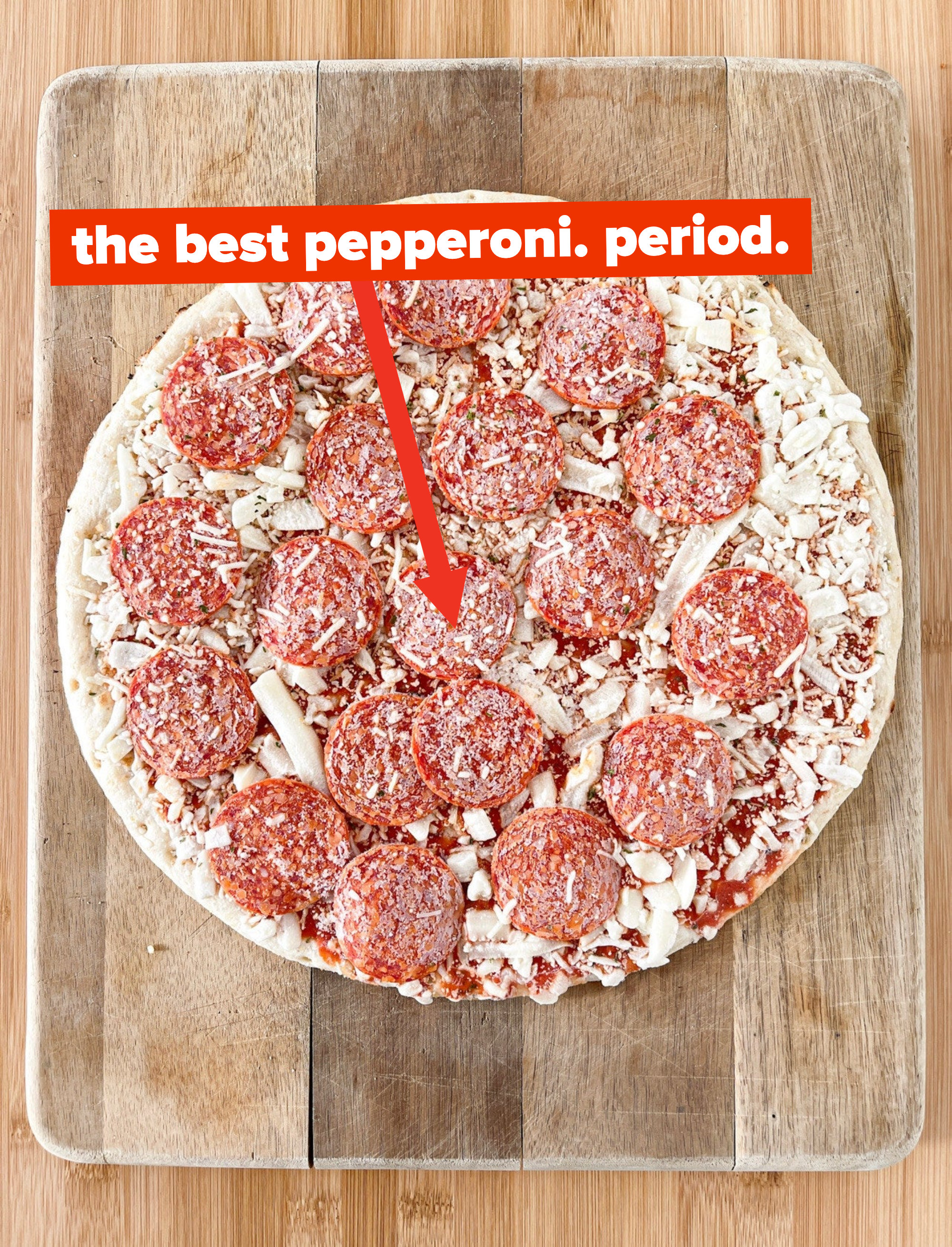 Uncooked Newman&#x27;s Own pizza with text &quot;the best pepperoni, period.&quot;