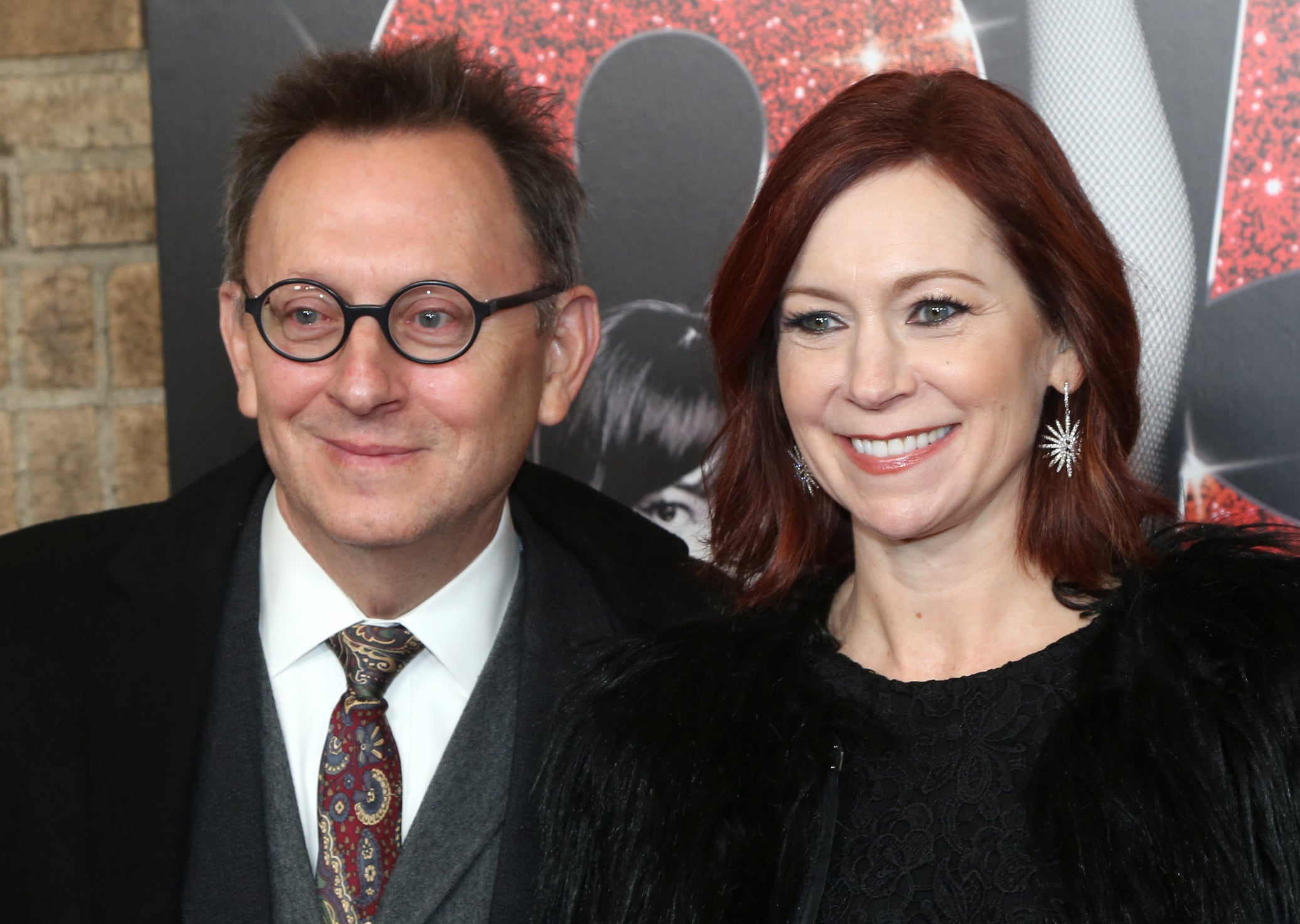Michael Emerson and Carrie Preston smiling together