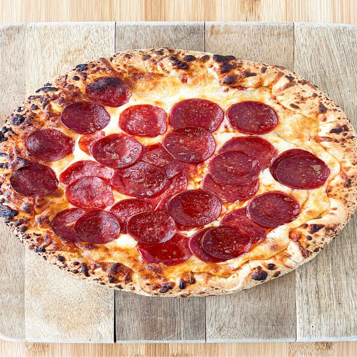 Baked Freschetta pizza with a golden brown crust