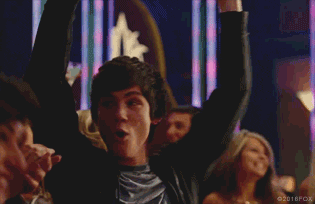 Percy raising his hands in excitement