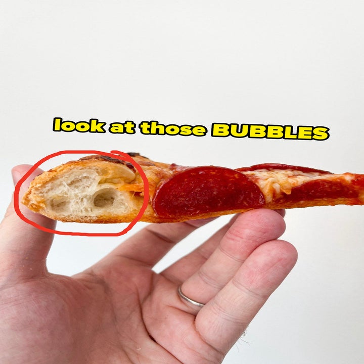 Bubbling pizza crust with text "look at those BUBBLES"