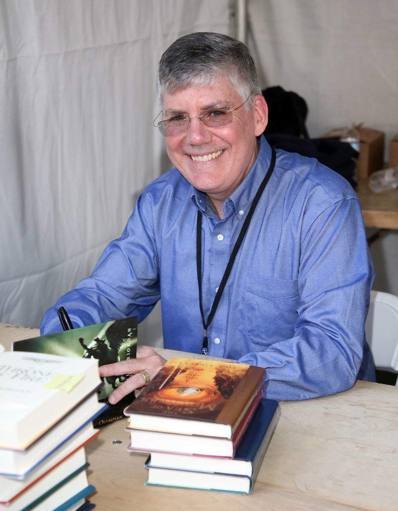 Rick smiling  at a book signing