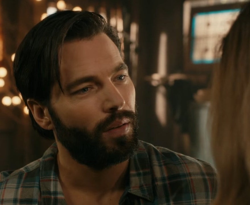 Mutt played by Tim Rozon in a plaid shirt