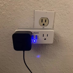 The same plug with the light significantly dimmed