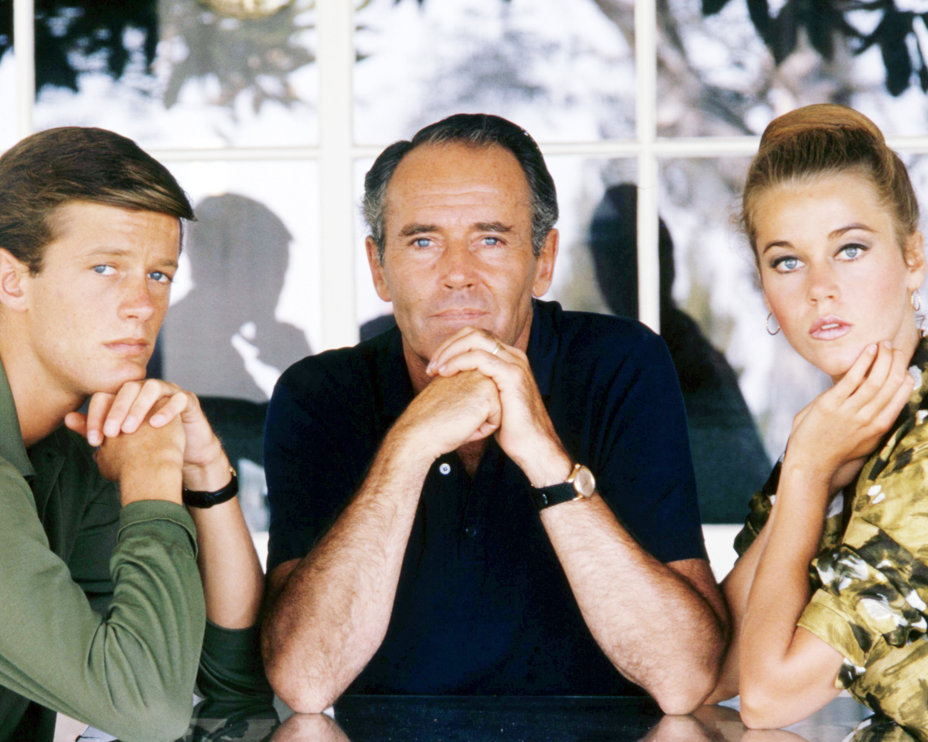 Peter Fonda, Henry Fonda, and Jane Fonda posing