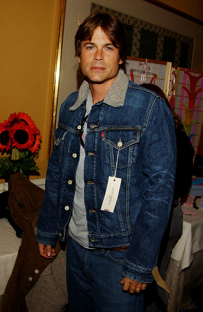 rob with a jean jacket that has a tag on it