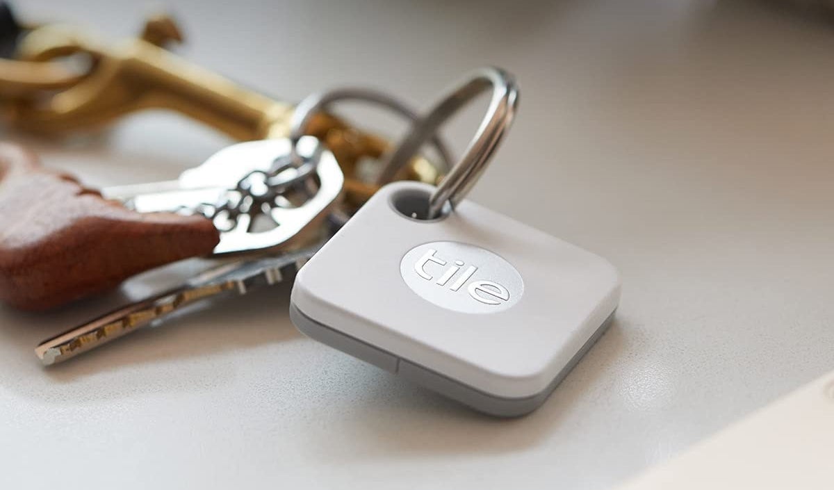 Tile bluetooth tracker attached to a keychain