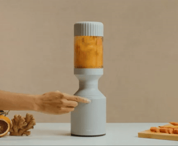 gif of someone turning on the blender to make a smoothie