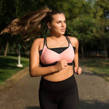 a model wearing the band under their sports bra