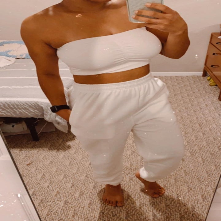 Reviewer wearing white pants