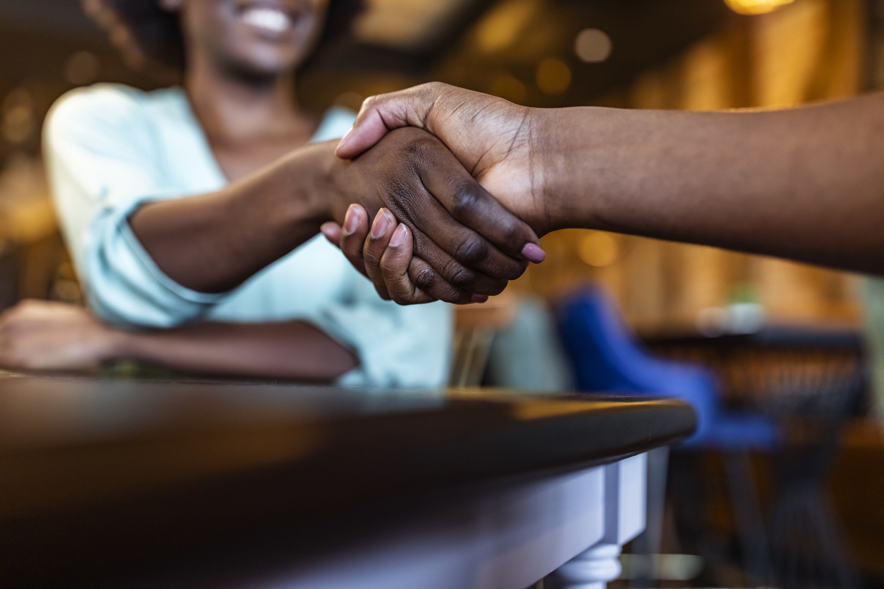 Two people shaking hands