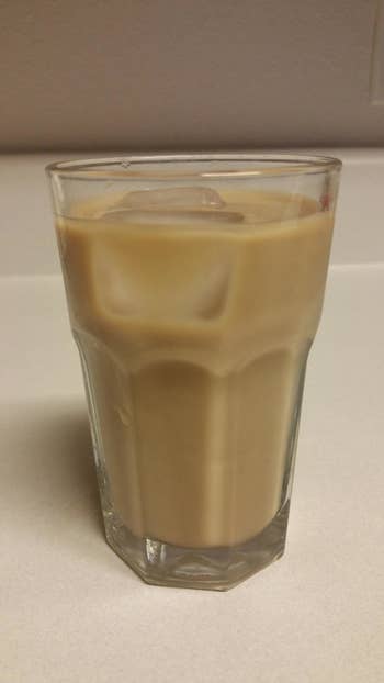 a reviewer's glass of iced coffee