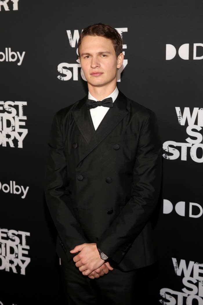 Ansel, in a tuxedo, poses for photographers at the premiere of West Side Story