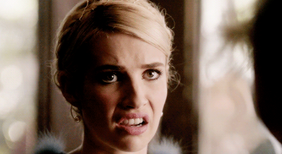 Emma Roberts from Scream Queens with a disgusted facial expression
