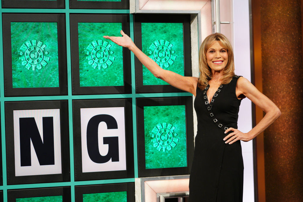 Vanna White revealing some letters on Wheel Of Fortune