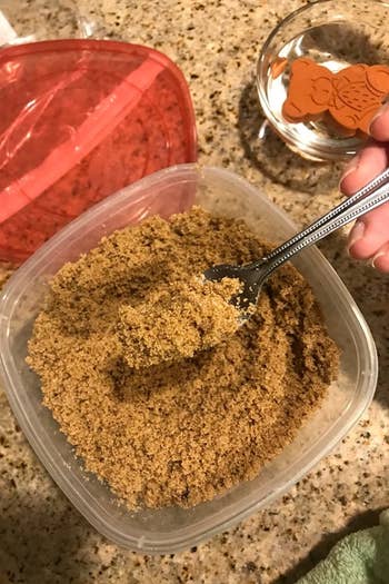 a reviewer photo of the same container now filled with soft brown sugar