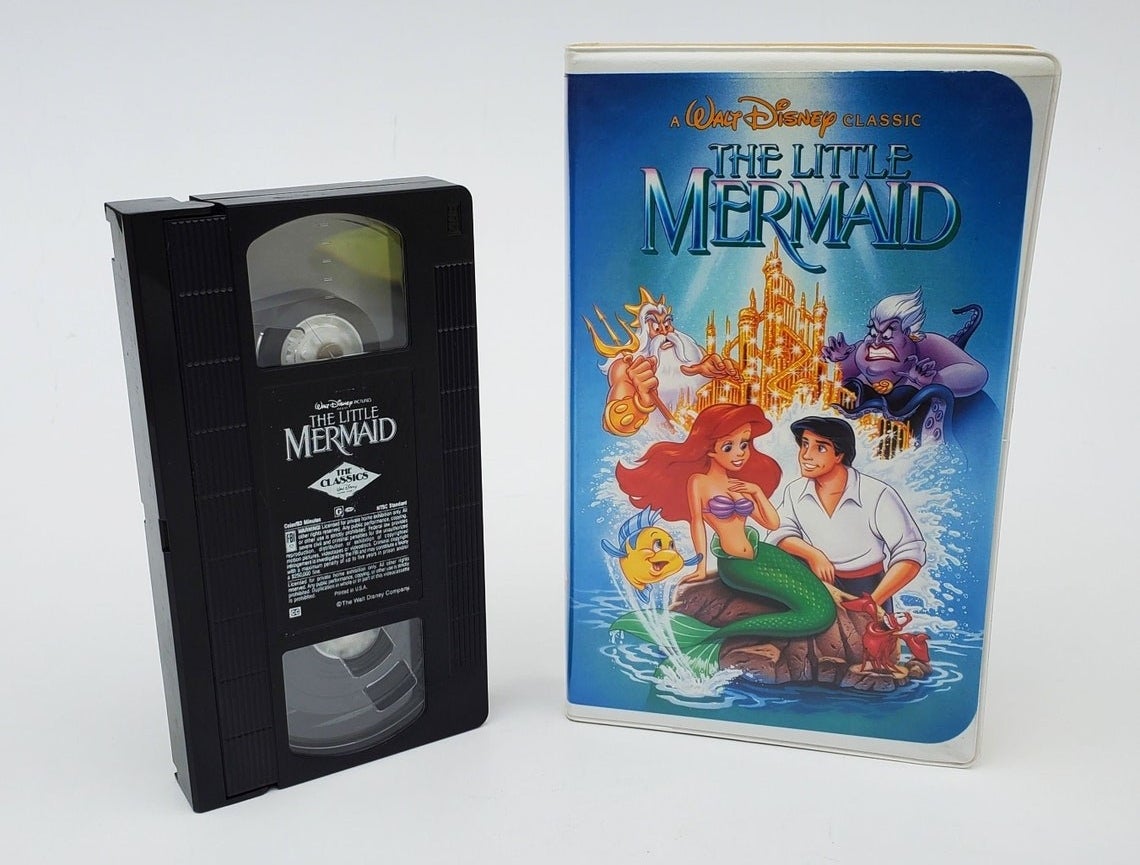 A VHS tape and the VHS case of The Little Mermaid