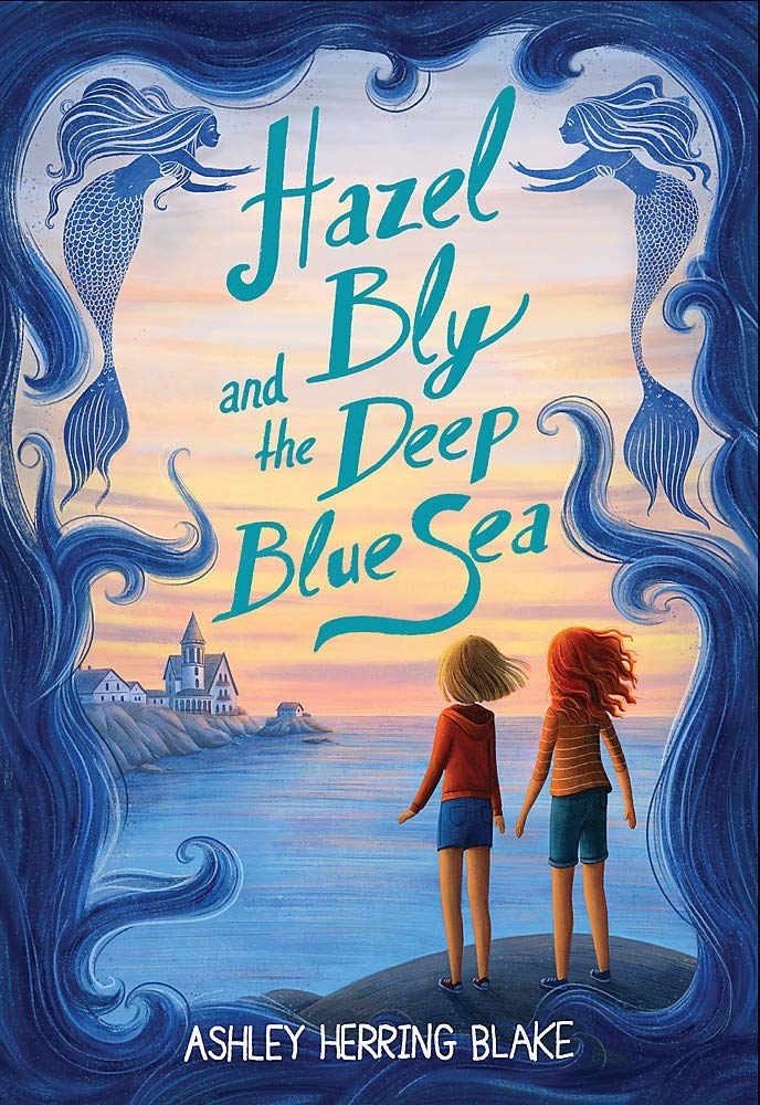 Two white girls, one with red hair, the other blonde, stand facing the ocean at sunset. Around them are two illustrated mermaids. The title reads: &quot;Hazel Bly and the Deep Blue Sea&quot;