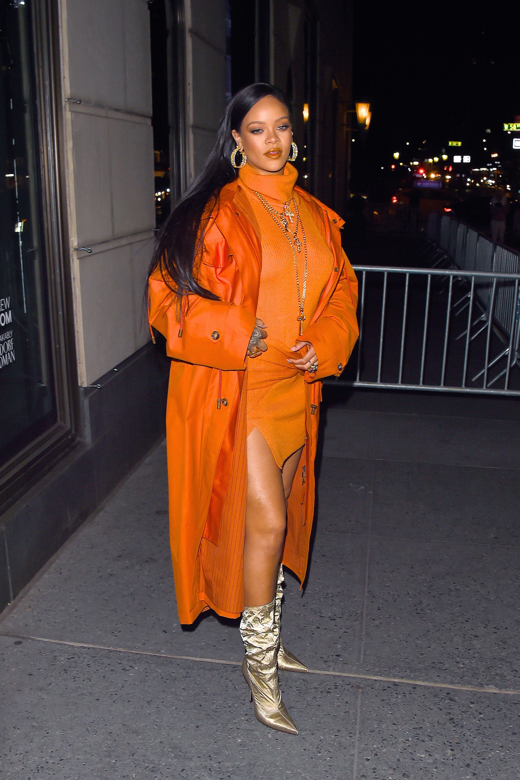 Rihanna posing outside at a Fenty Beauty event