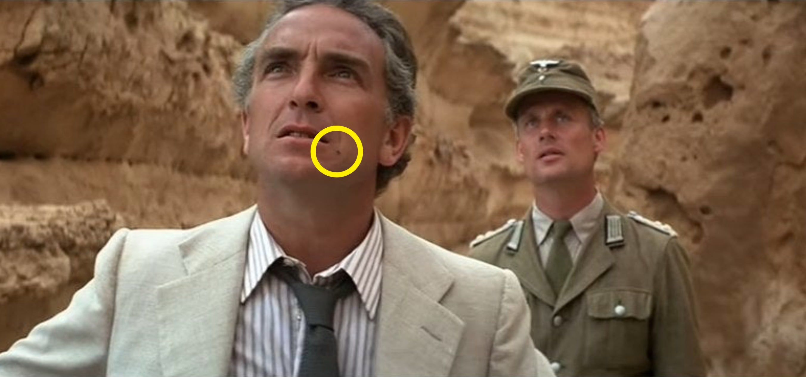 René Belloq with a fly on his face in &quot;Raiders of the Lost Ark&quot;