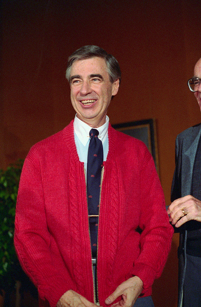Mr. Rogers in his famous red cardigan