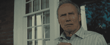 Clint Eastwood shaking his head in disgust