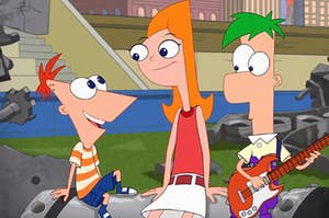 Candace Flynn sits in the middle between her two brothers, Phineas and Ferb