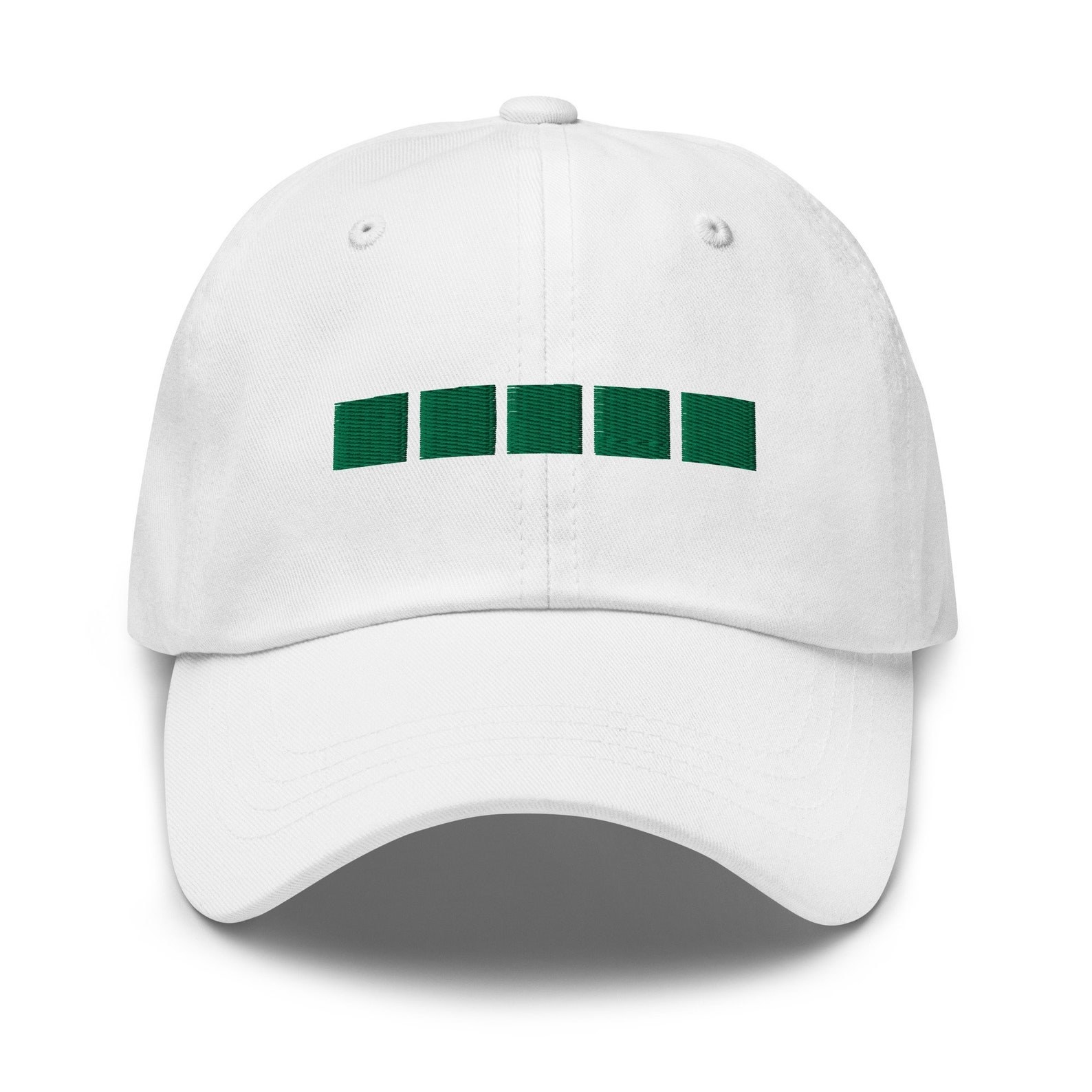 white baseball cap with five green tiles on it