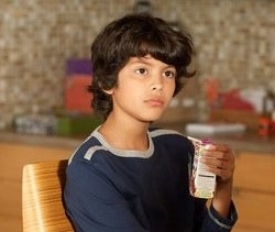 young Xolo drinking a juice box