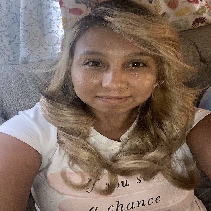 reviewer photo of their curled and voluminous hair