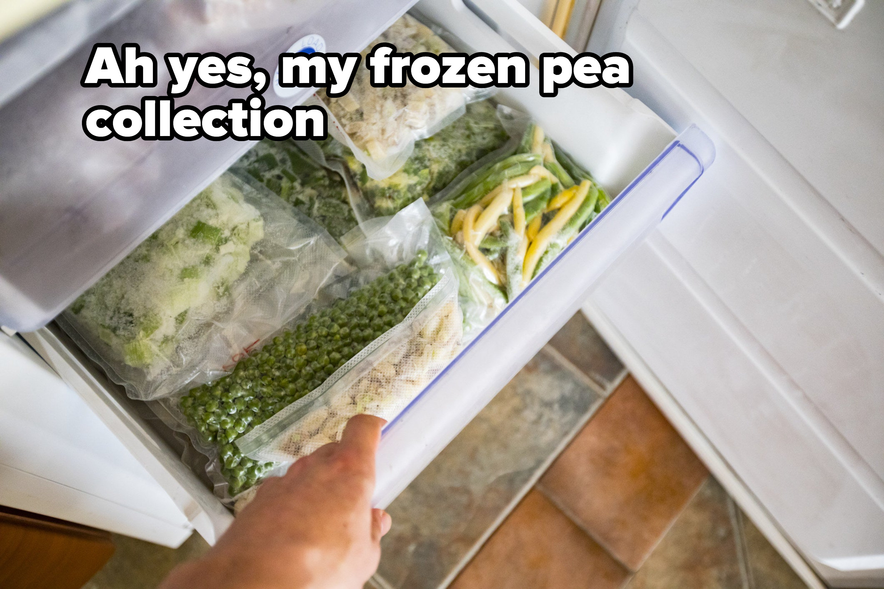 a drawer of frozen peas
