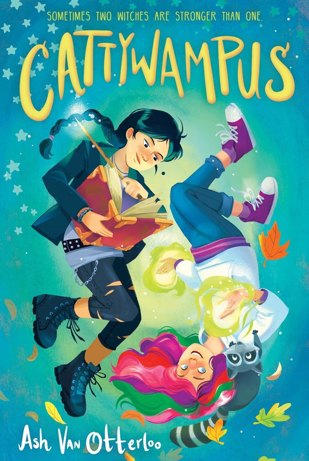 Two white girls are on the blue cover. One holds a book and a wand, the other is upside down and has glowing hands and a raccoon on her shoulder. Title reads: &quot;Cattywampus&quot;