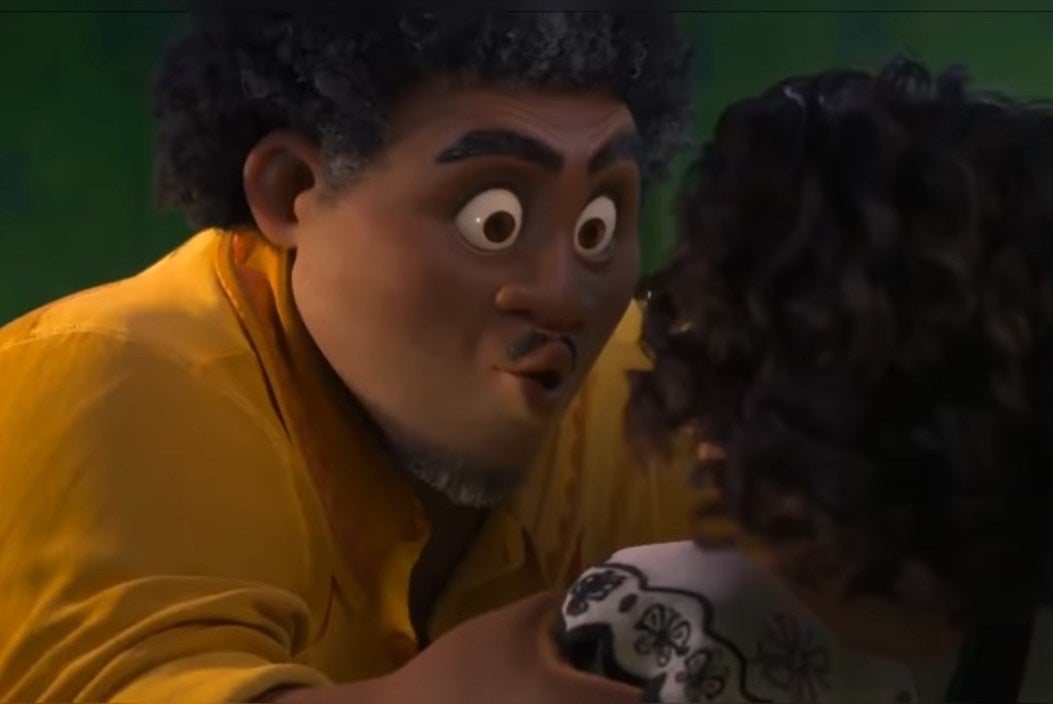 Felix Madrigal grabbing Mirabel as they start talking about Bruno
