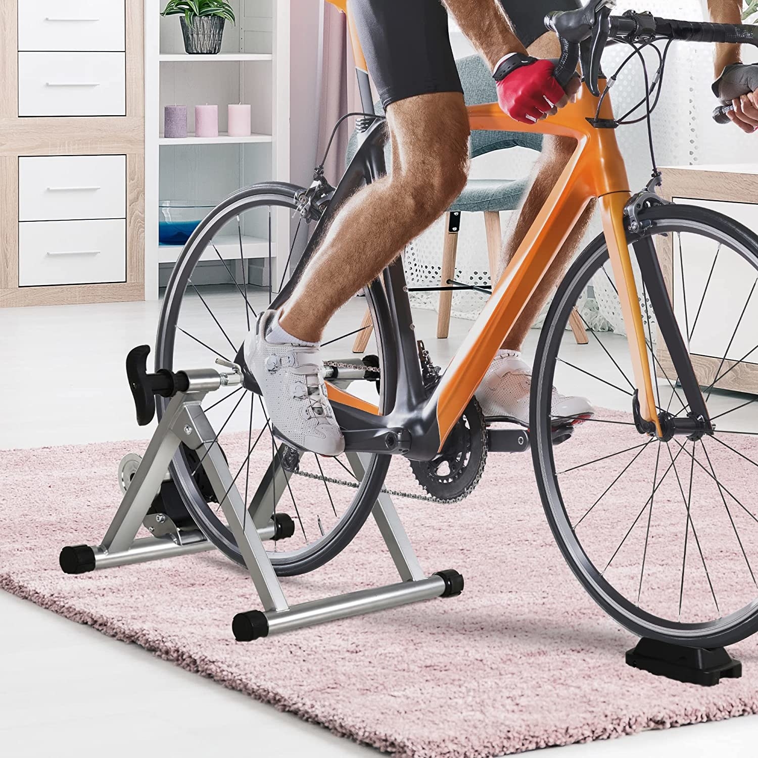 A bike on the stand on a plush carpet